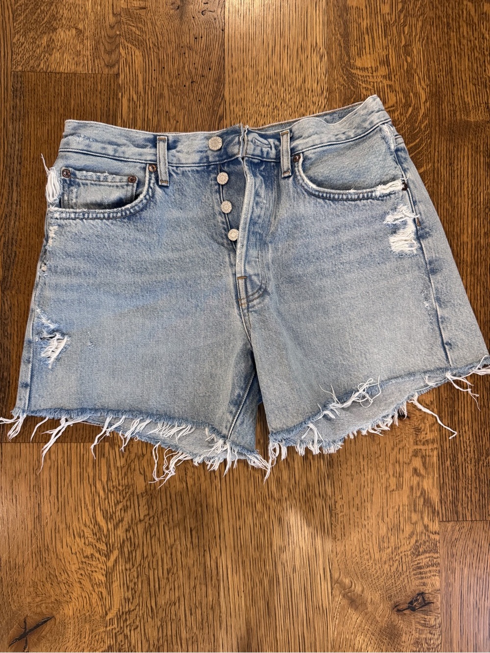 Agolde Light Blue Distressed Button-Front Denim Shorts